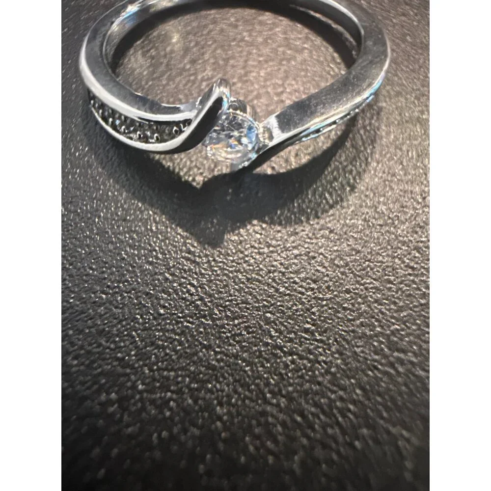 Sterling Silver Plated Twist Engagement Ring With Cubic Zirconia Stone